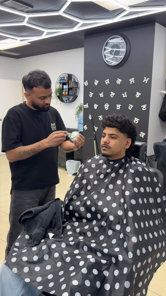 Barber at work in the shop